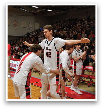 A group of basketball players are celebrating a victory on the court. AI generated content