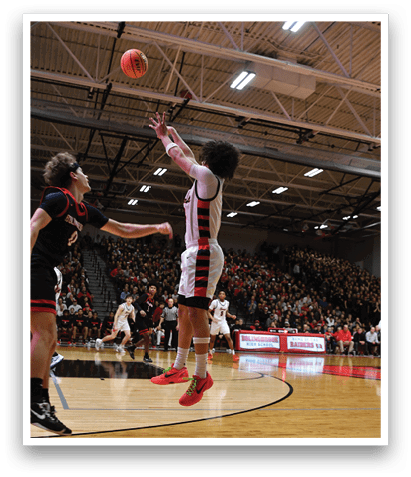 Two basketball players are fighting for the ball in a game. AI generated content