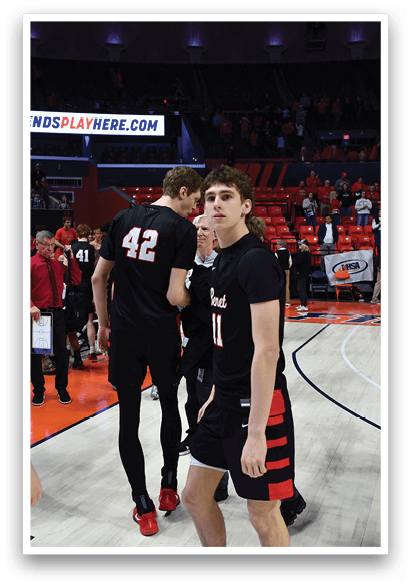 A group of men wearing black jerseys are standing on a basketball court. AI generated content