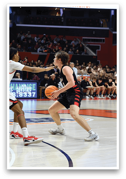 A basketball game is in progress with a player dribbling the ball. AI generated content