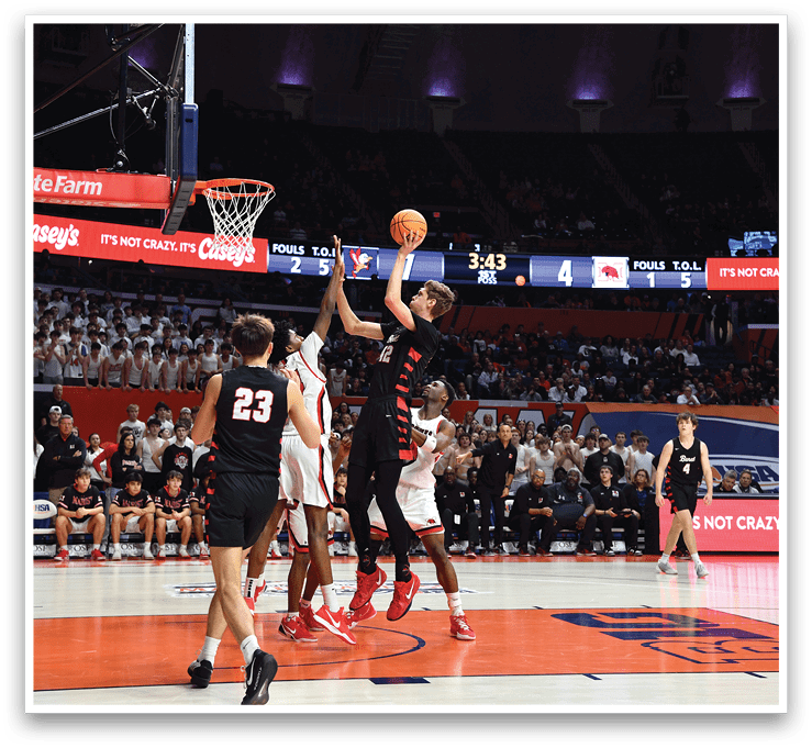 Basketball players on a court with a man jumping to block a shot. AI generated content
