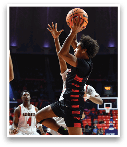 Two basketball players are fighting for the ball, with one player attempting to block the other from getting the ball. AI generated content