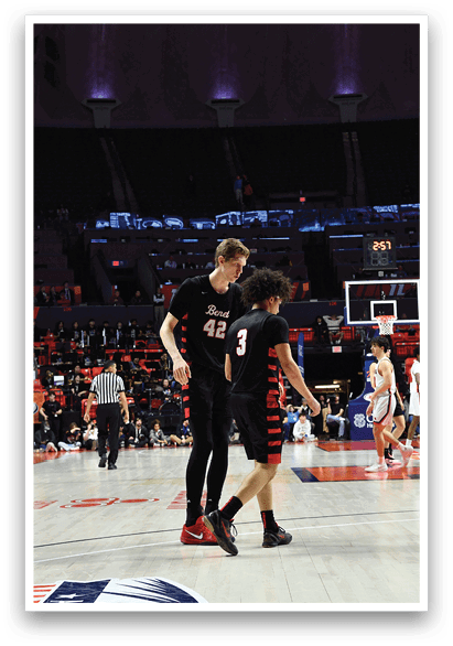 A group of men playing basketball on a court. AI generated content