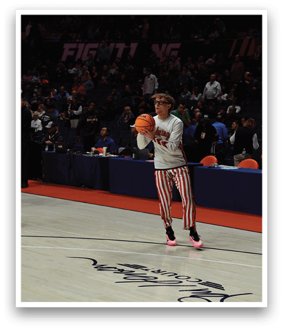 A basketball player is holding a ball in front of a crowd of people. AI generated content