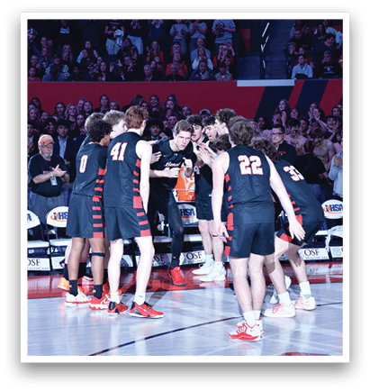 A group of young men are playing basketball on a court, with one player holding a trophy. AI generated content