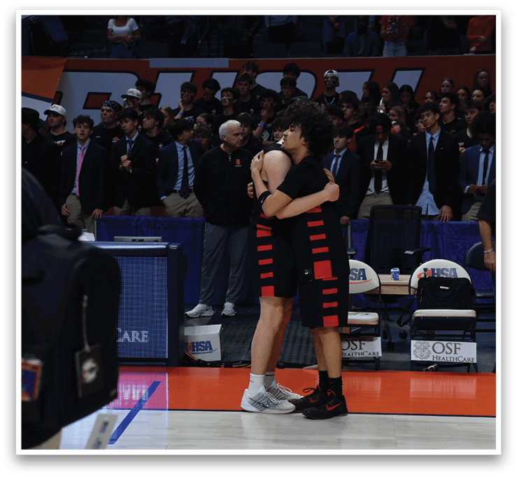 Two people hugging on a basketball court. AI generated content