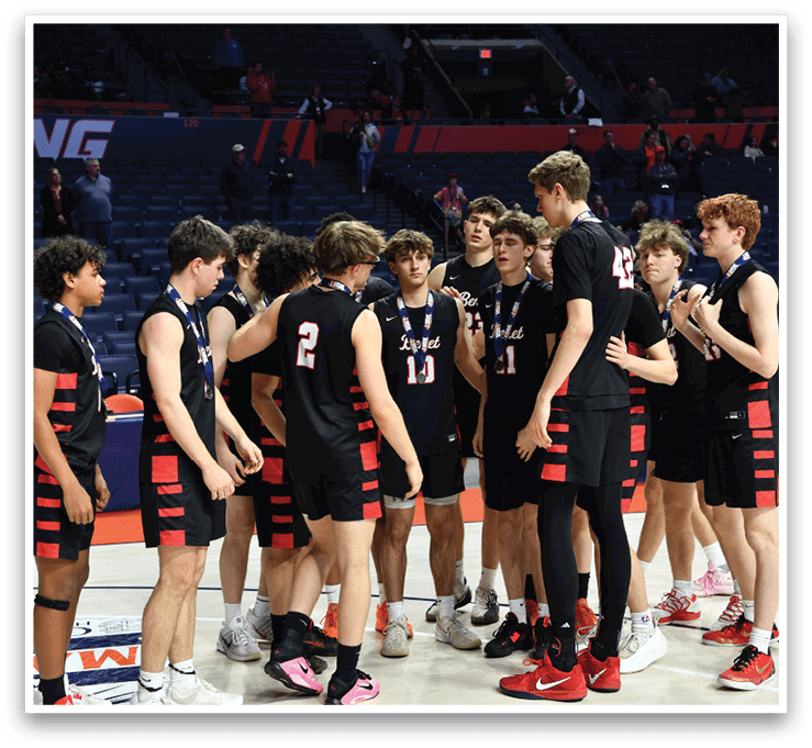 A group of young men wearing black and red uniforms are standing on a basketball court. AI generated content