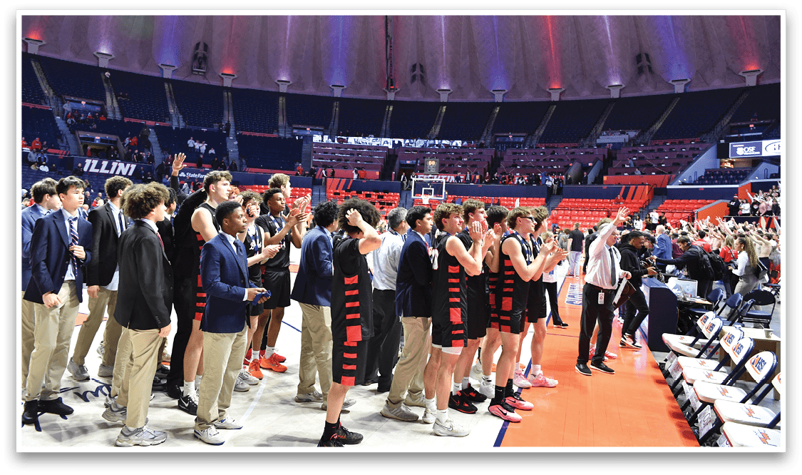 A group of young men wearing suits and ties stand on a basketball court, some of them holding their hands up. AI generated content