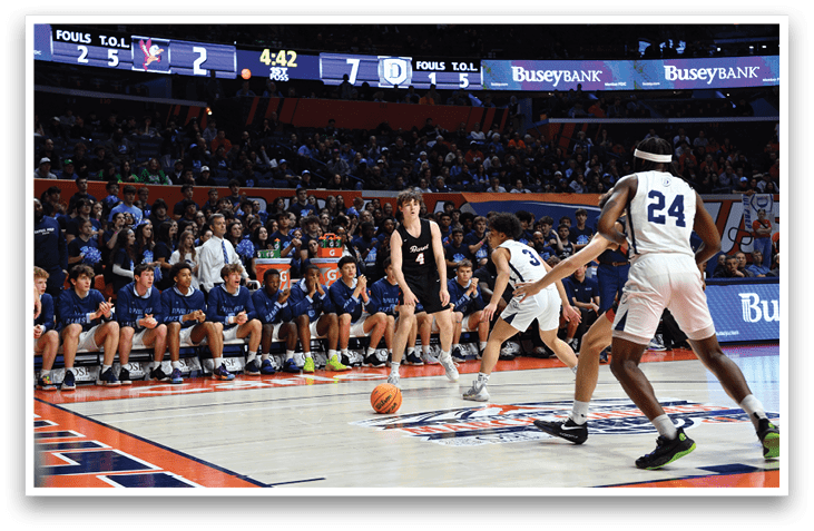 A basketball game is in progress with a player in the foreground about to shoot the ball. The crowd is watching intently. AI generated content