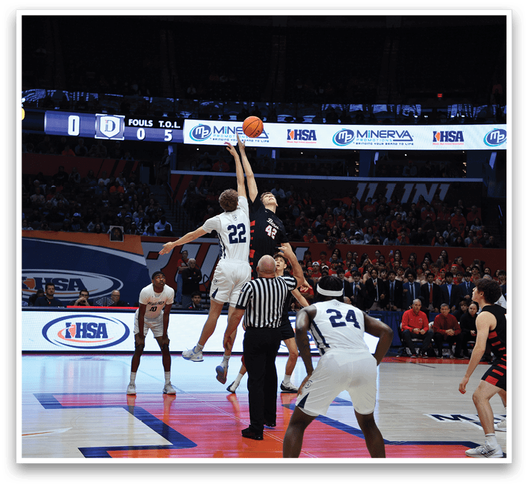 Basketball players on a court, one player is jumping to block a shot. AI generated content