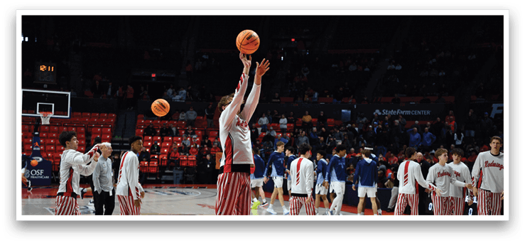 A basketball player in a red and white striped uniform jumps to catch a basketball. AI generated content