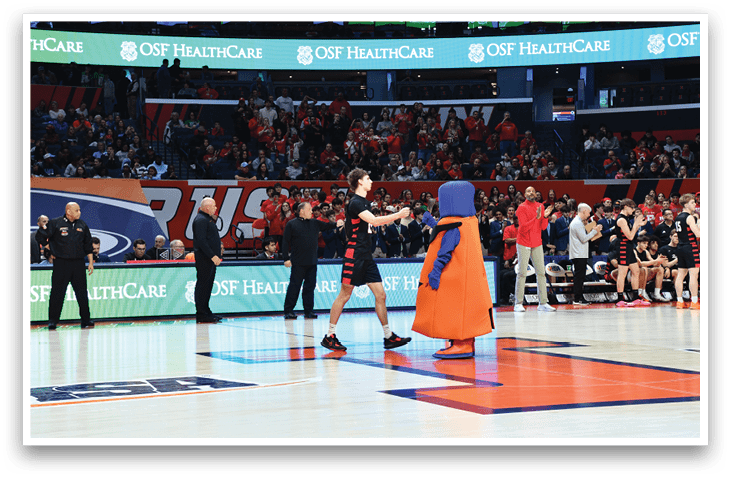 A group of people are playing basketball on a court. AI generated content