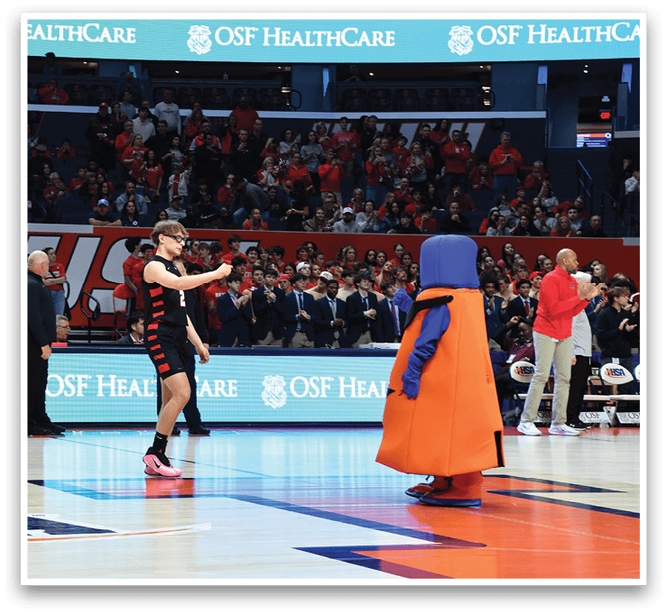 A man in a red shirt is standing on a basketball court, holding a basketball. AI generated content