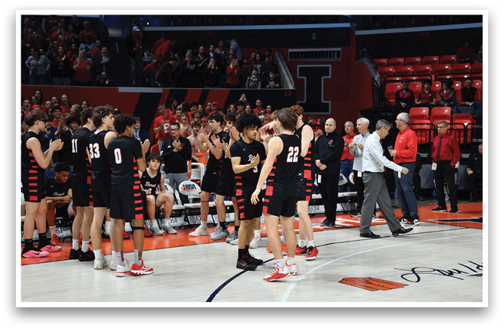 A group of men wearing black jerseys are standing on a basketball court. They are clapping and celebrating. AI generated content