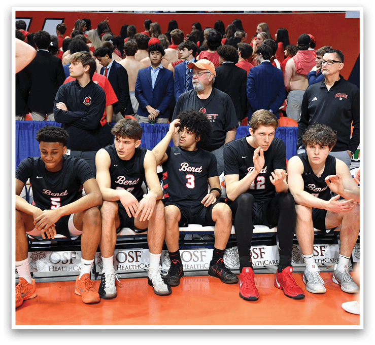 A group of men wearing black jerseys are sitting on a bench. AI generated content