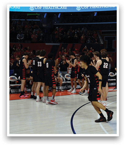 A group of men in black jerseys are standing on a basketball court. AI generated content