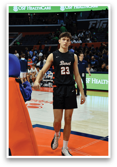 A man in a basketball uniform stands on a basketball court with a mascot beside him. AI generated content