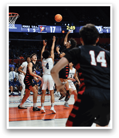 A group of men playing basketball on a court. AI generated content