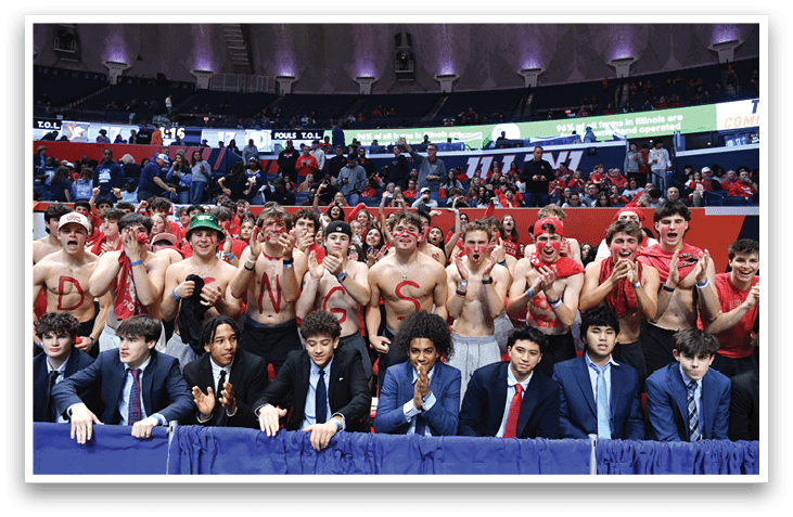 A group of people are sitting in the stands at a stadium, wearing red and white clothing. They are watching a game and cheering for their team. AI generated content