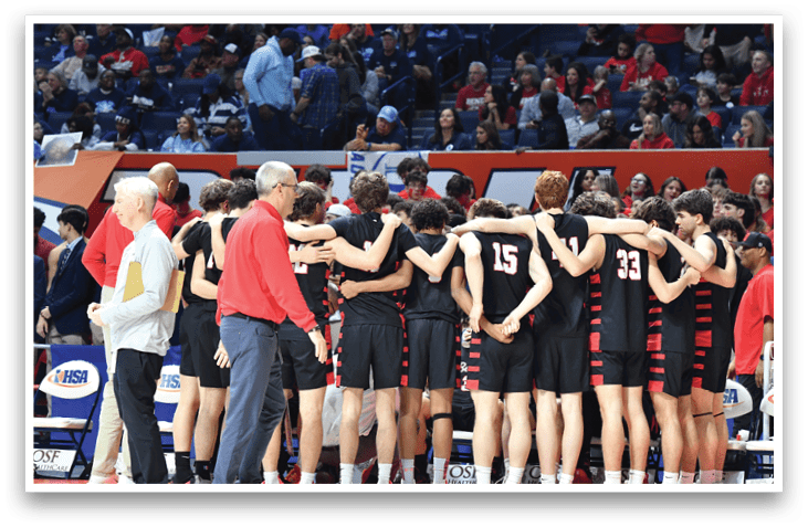 A group of men in black jerseys huddle together on a basketball court. AI generated content