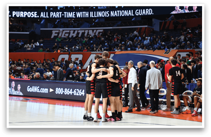 A group of men hugging each other on a basketball court. AI generated content