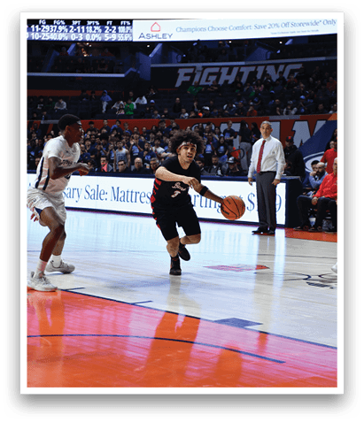 A basketball player is dribbling the ball while another player is trying to block him. AI generated content
