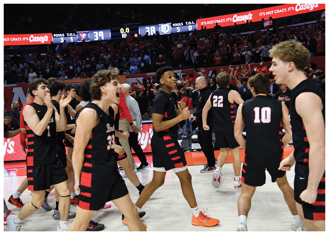 A group of young men celebrating a victory on a basketball court. AI generated content