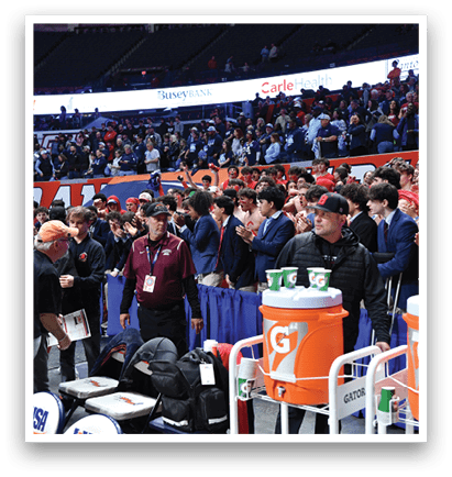 A large crowd of people are watching a basketball game. AI generated content