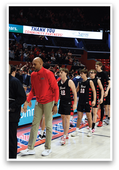 A group of men in black shirts and red jackets are lined up on a basketball court. AI generated content