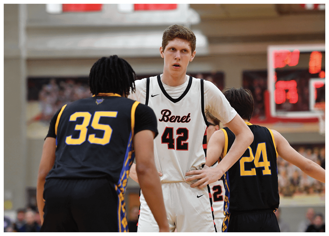 A group of basketball players on the court, one of them wearing a number 35 jersey. AI generated content