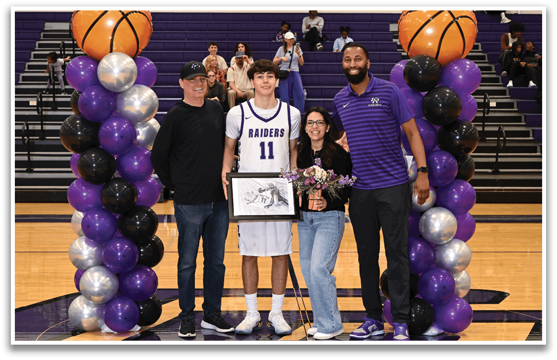 A group of people, including a young man holding a basketball, pose for a photo. Contenido generado con IA