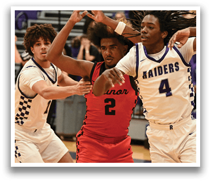 A group of men playing basketball, one of them wearing a red jersey. Contenido generado con IA