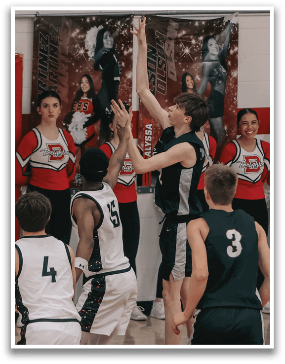 A group of people playing basketball in a gym. AI generated content