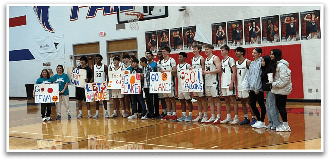 A group of people are standing on a basketball court holding up signs. AI generated content