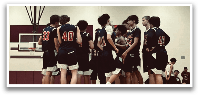 A group of basketball players wearing black uniforms are standing on a basketball court. AI generated content