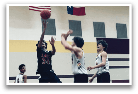 A basketball game is in progress with a player jumping up to grab the ball. AI generated content