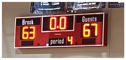 A basketball court with a scoreboard displaying the score of 63 to 67. AI generated content