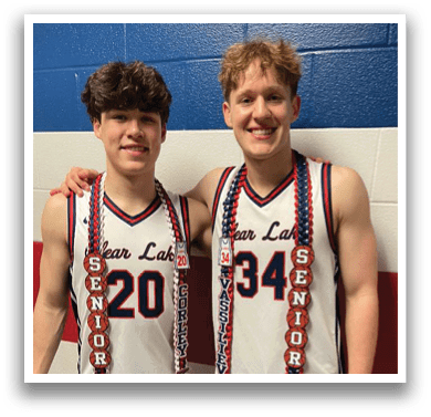Two young men wearing basketball uniforms and holding ties pose for a picture. AI generated content