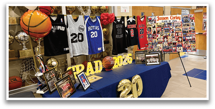 A display of basketball jerseys and memorabilia is set up in a gymnasium. AI generated content