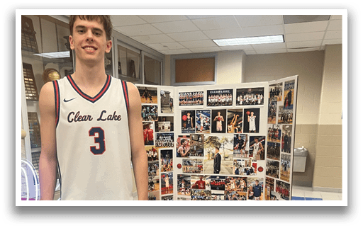 A man stands next to a cardboard cutout of himself. AI generated content