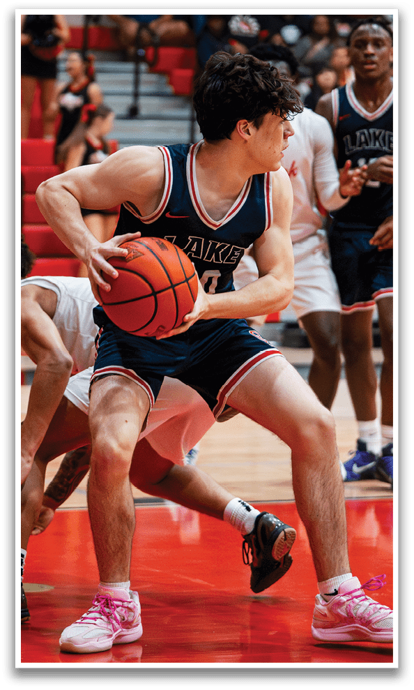 A group of basketball players on a court, one of them holding a basketball. AI generated content