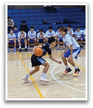 A group of people are playing basketball on a court. AI generated content