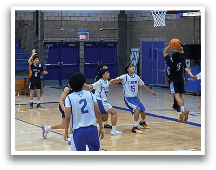 A group of men playing basketball on a court. AI generated content