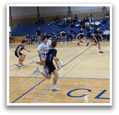 A group of people playing basketball on a court. AI generated content