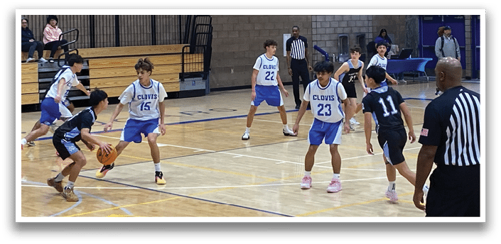 A group of people playing basketball in a gym. AI generated content