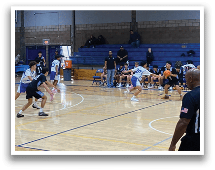 A group of people playing basketball in a gym. AI generated content