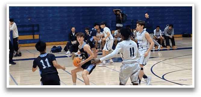 A group of young men playing basketball on a court. AI generated content