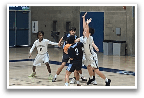 A group of young men playing basketball on a court. AI generated content