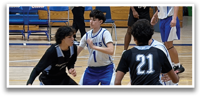 A group of young men playing basketball on a court. AI generated content