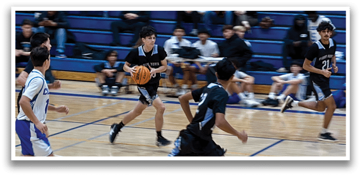 A group of young men playing basketball on a court. AI generated content
